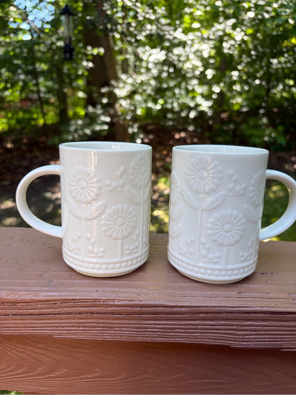 Two Starbucks 12 oz ceramic mugs with embossed daisy or sunflower floral design - Picture 14 of 14